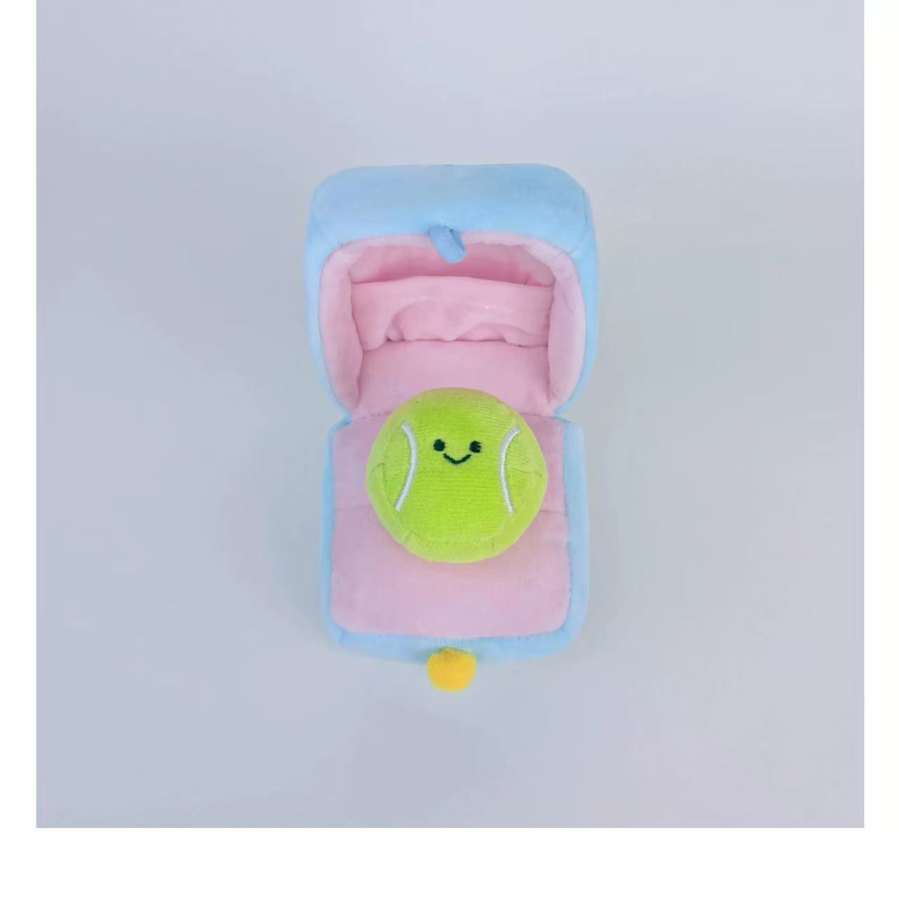 Naisi Surprise Tennis Ring Box! A cute tennis toy that opens to reveal a hidden mini-doll inside.