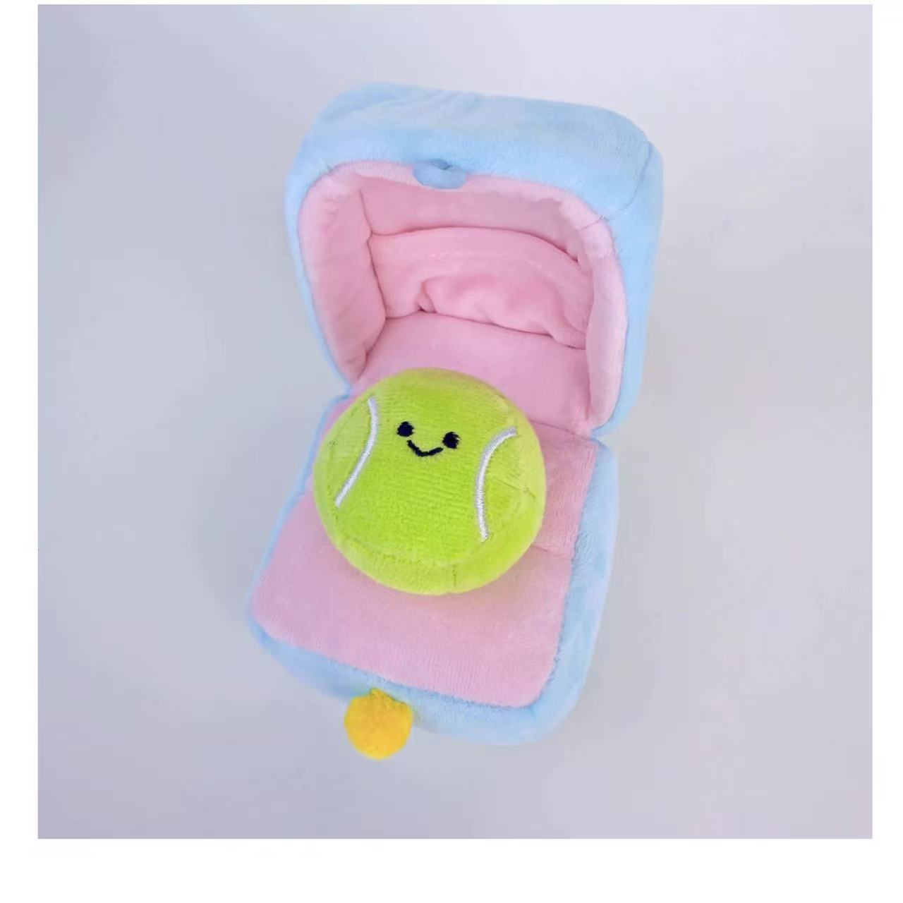 Naisi Surprise Tennis Ring Box! A cute tennis toy that opens to reveal a hidden mini-doll inside.